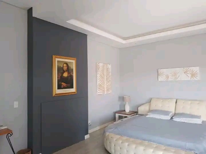 painted and furnished bedroom