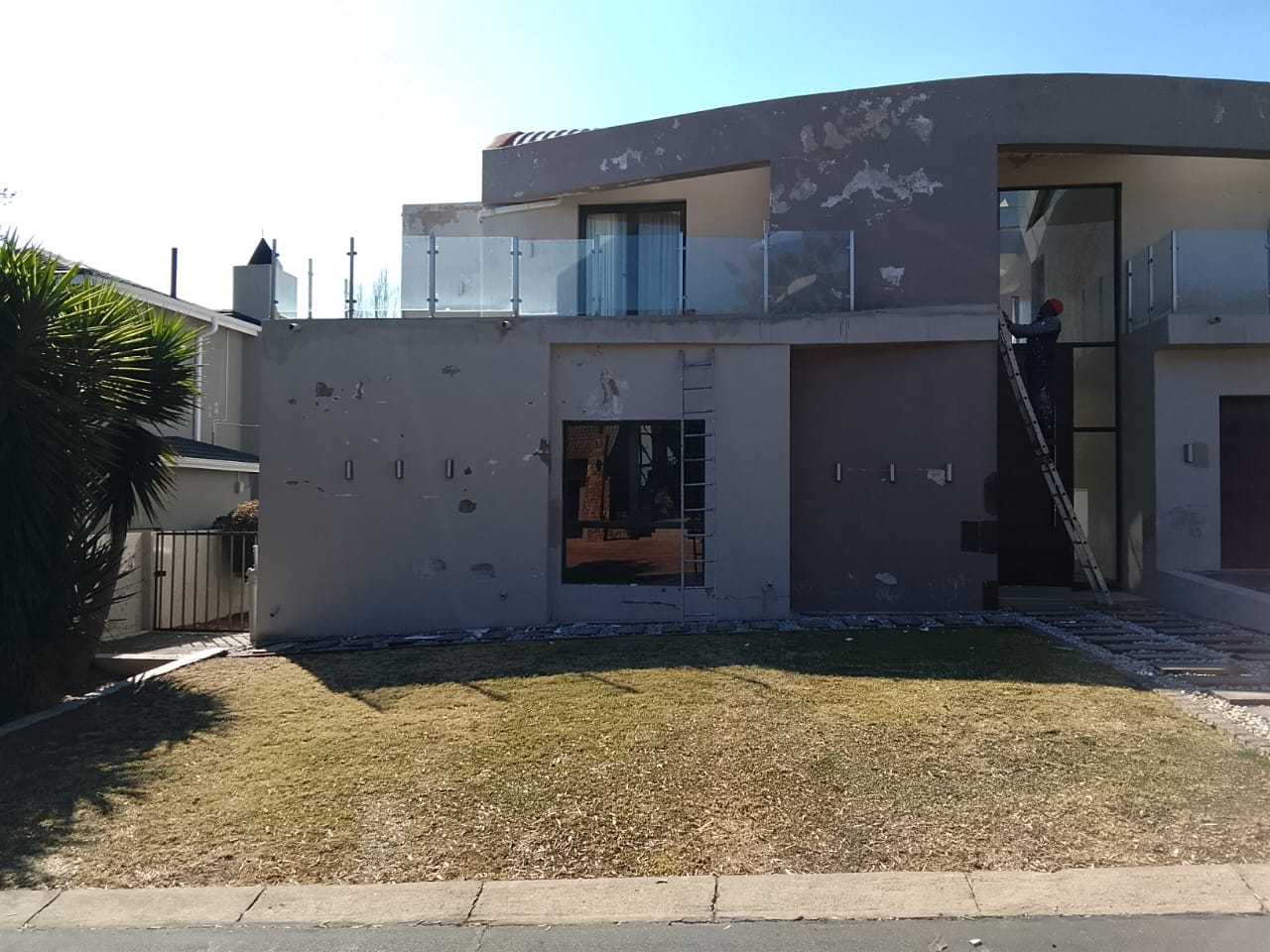 house being prepped for repainting