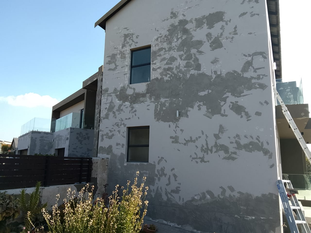 house being prepped for painting