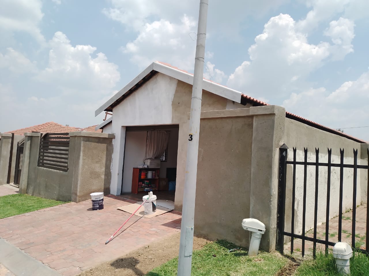 house being prepped for painting