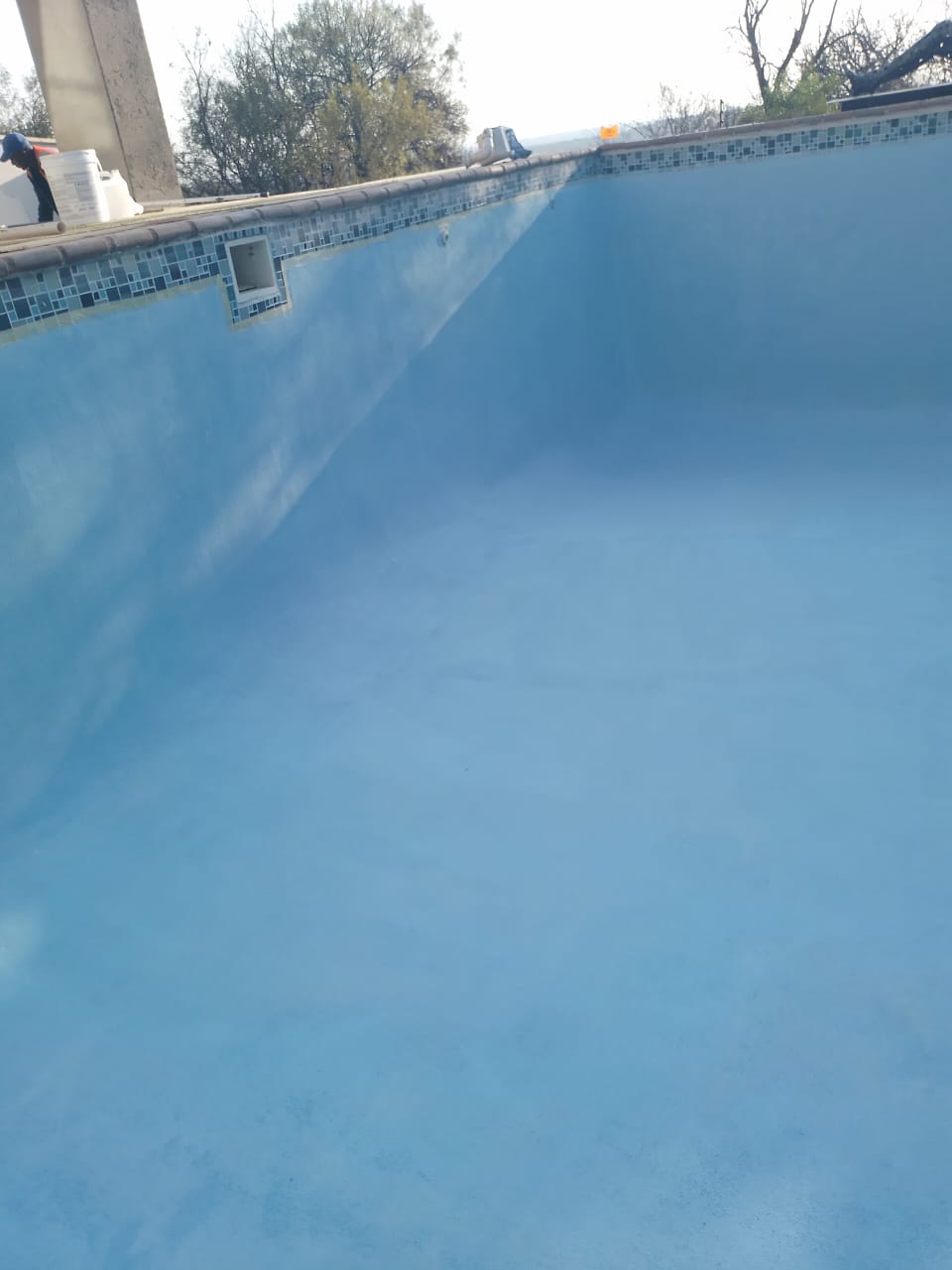 empty swimming pool newly resurfaced