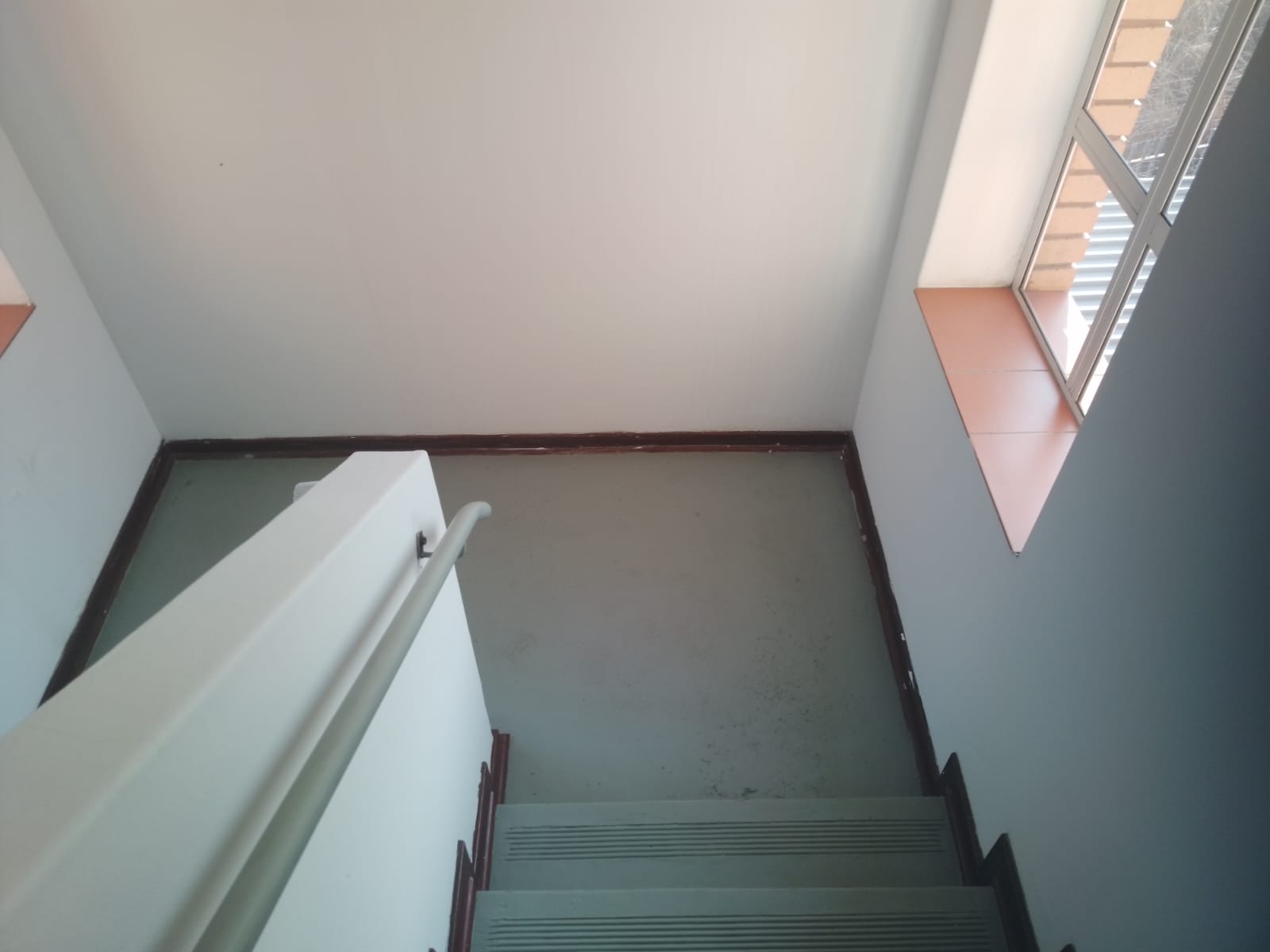 walls painted white in a stairwell