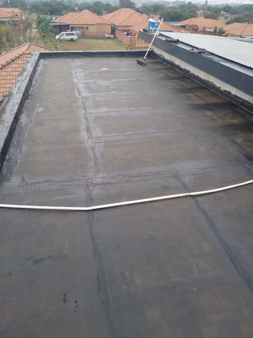torch-on waterproof membrane on flat roof