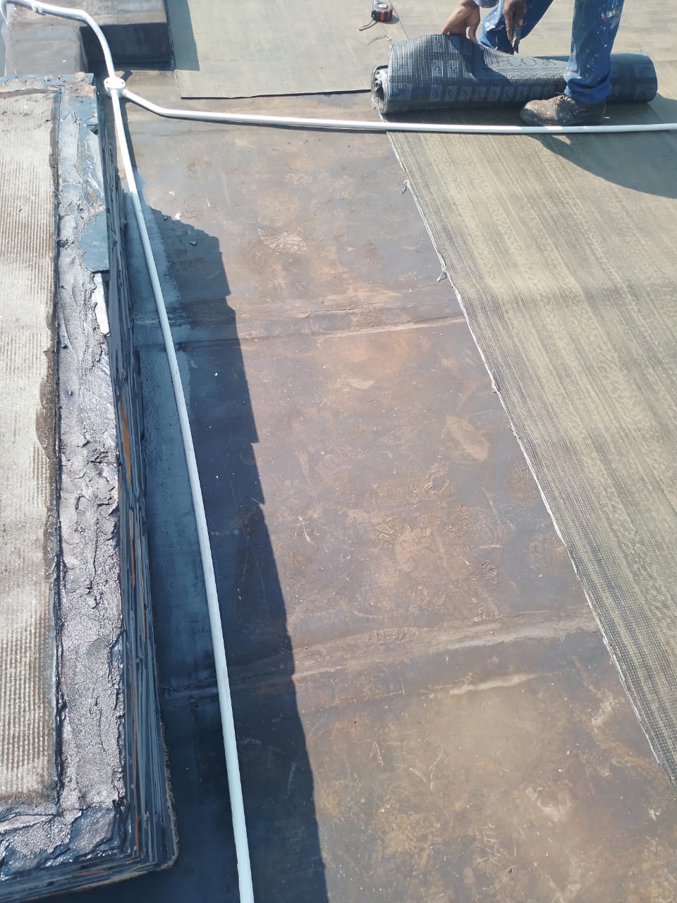 torch-on waterproof membrane on flat roof